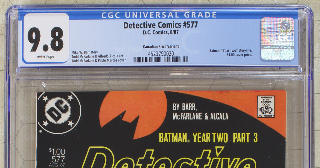 Comic book in a protective case with a grading label on a tiled background